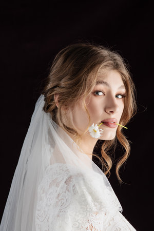Very beautiful wedding flower in the hands of the brideの写真素材