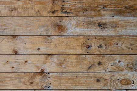 Vintage gray wood background texture with knots and nail holes. Brown abstract background. Vintage...