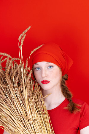 Beautiful Fashion art portrait of young sexy blonde woman with wheat. Organic cosmetic products for healthy hair conceptの写真素材