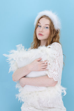 Hand Skin Care. Woman Hands With Soft White Feather. bodycareの写真素材