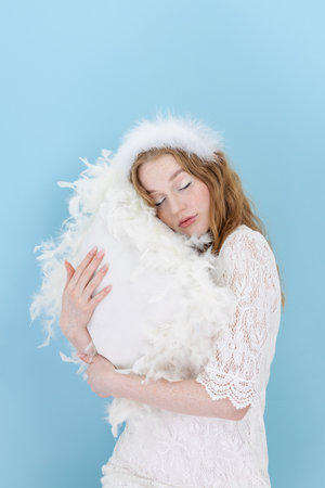 Hand Skin Care. Woman Hands With Soft White Feather. bodycareの写真素材