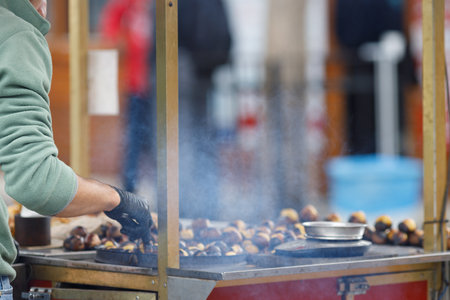 street seller making chestnuts in Istanbulの写真素材