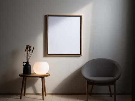 Interior of modern living room with empty picture frame, chair and lamp.の素材