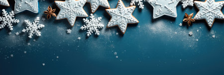 Christmas greeting card. Festive decoration on blue background. New Year concept. Copy space. Flat lay. Top view.の素材