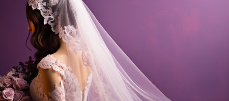 Beautiful bride in a white wedding dress with a veil on a purple backgroundの素材