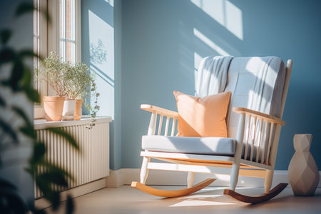 Comfortable rocking chair with pillows in bright living room interior.の素材