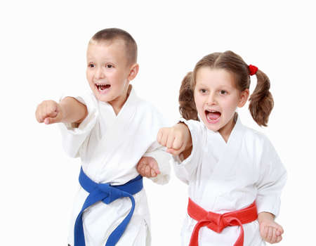 Athletes boy and a girl beat a punch arm on a white backgroundの写真素材