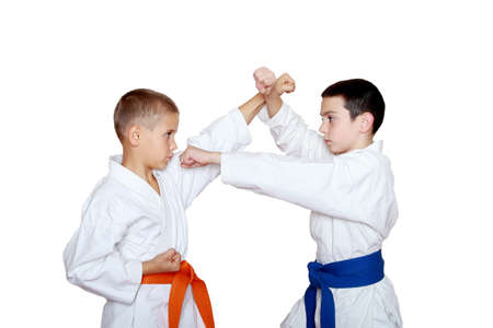 Athletes with orange and blue belt doing receptionの写真素材