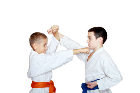 Two athletes train punch and protection blockの写真素材