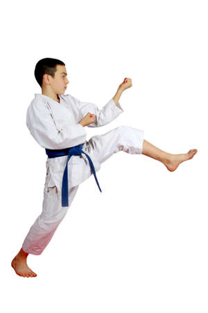 With a blue belt athlete beat a direct kick legの写真素材