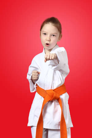 Straight punch hand is doing a girl in a kimonoの写真素材