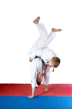 Dressed in a kimono little athletes train throwsの写真素材