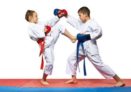 Paired exercises karate in performing athletes in karategiの写真素材