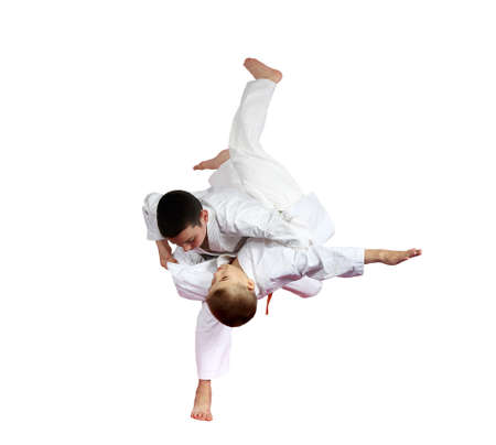 High throw judo are doing athletes  on a white background isolatedの写真素材