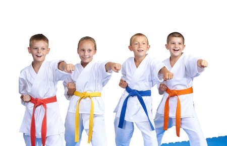 cheerful athletes are hitting punch handの写真素材