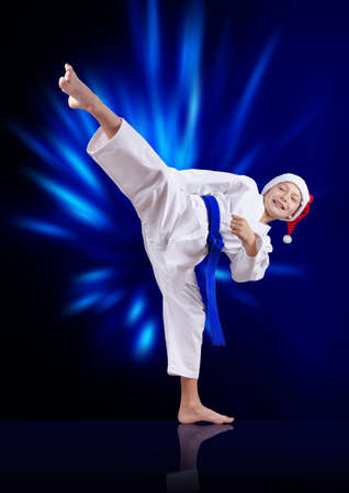 With a blue belt athlete beats kickingの写真素材