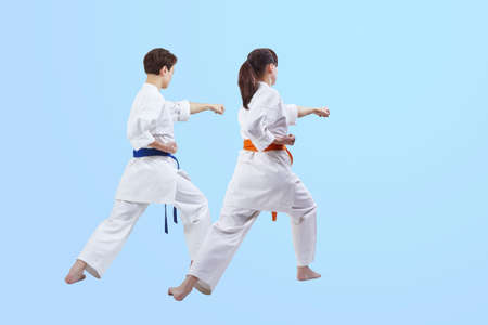 Against a light background, the girls hit with a handの写真素材