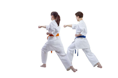 Girls are training punch hand against a white backgroundの写真素材