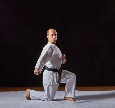 Sportsman makes the block with his right hand in a low rackの写真素材