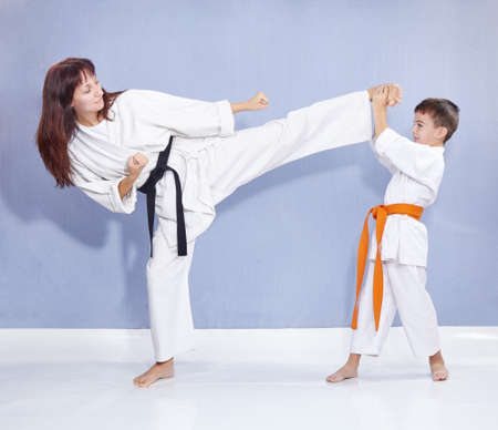 Mother and son are training kick legの写真素材