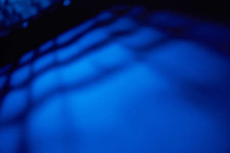 Blue background with black blurの写真素材