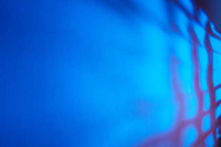 Blue background with purple stripes in the form of a grid