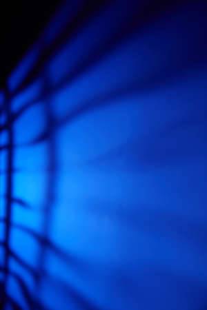 Light blue and black background with stripesの写真素材