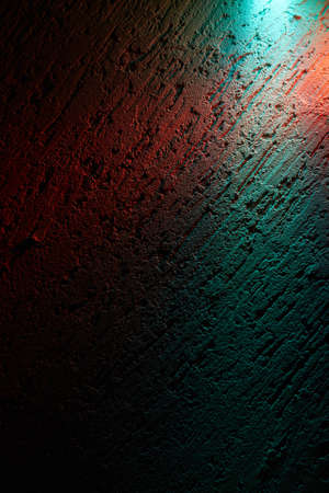 On a dark background the intersection of the rays of the and red