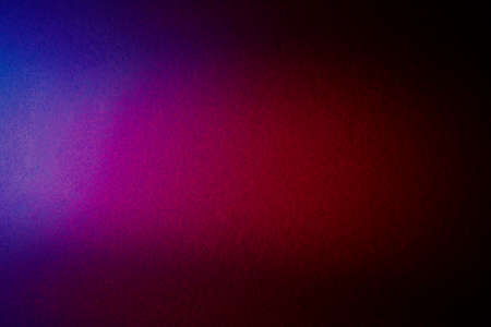 Blurred textural background with the advantage of dark redの写真素材