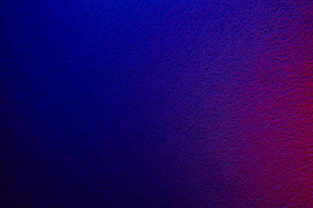 On a relief blue background a shade of pinkの写真素材