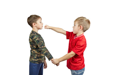 Over white isolated background two boy athlete perform hand grab and punch
