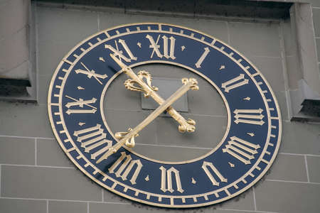 Antique clock on a tower shot closeup