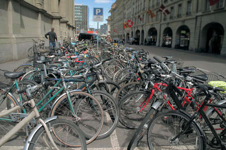 Many beautiful bikes in the parking lotの写真素材
