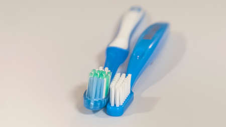 Two toothbrushes isolated on white backgroundの写真素材