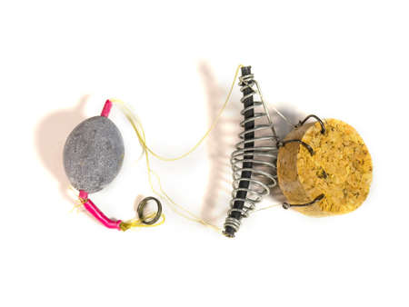 Fishing sinkers feeder hooks on a white background