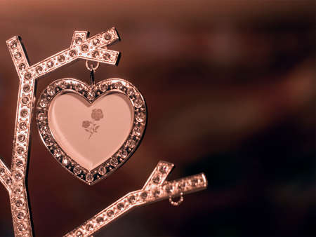 Glowing heart on the dark backgroundの写真素材