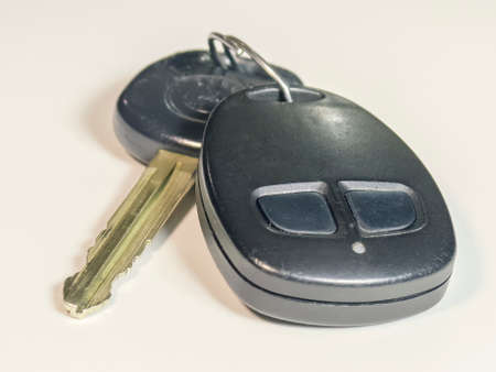 Key and alarm from the machine on a white background