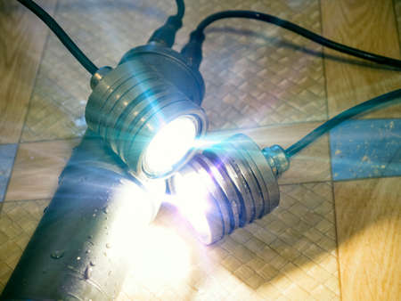 The huge powerful flashlight for the spearfishingの写真素材
