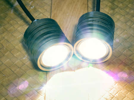 Two heads flashlight for the underwater hunting