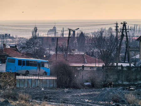 Black sea, morning, the industry and the blue busの写真素材