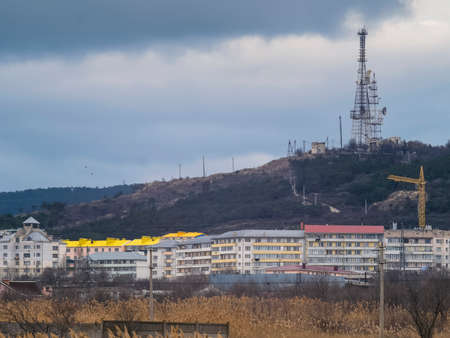 The suburbs and mountain with TV towerの写真素材