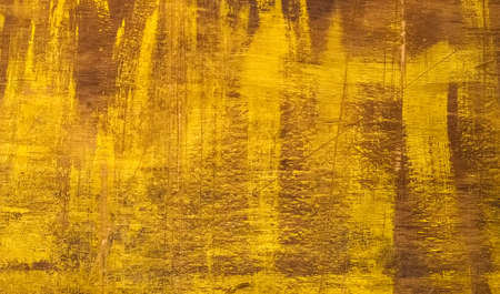 The old plywood texture painted with yellow paintの写真素材
