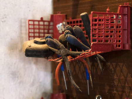 the old tools on a shelf in the garage