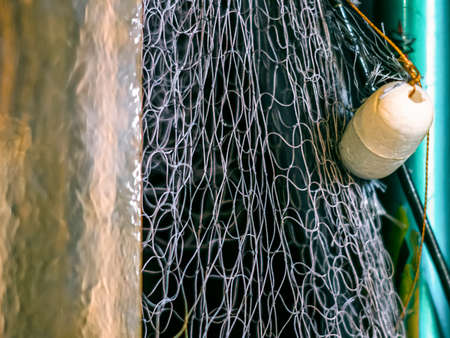 The fishing net hanging on the doorの写真素材