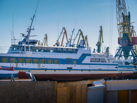 The cranes at the port and old shipの写真素材