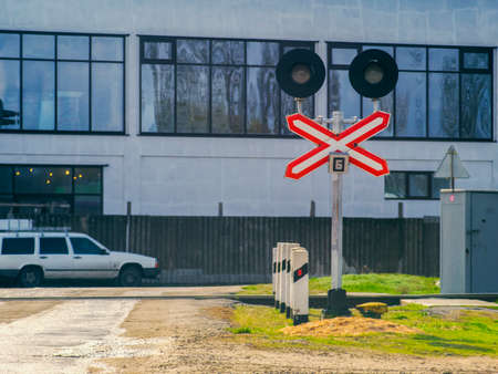 The sign for cars at the railway crossingの写真素材