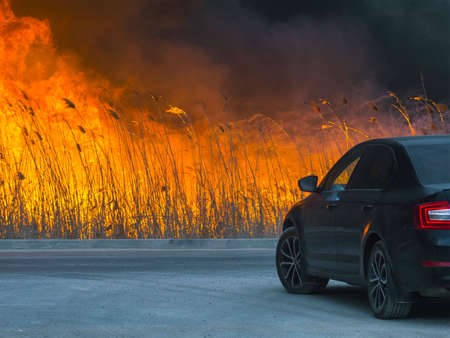 The car is about the huge dangerous fireの写真素材