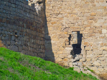 The destroyed wall of the old Genoese fortressの写真素材