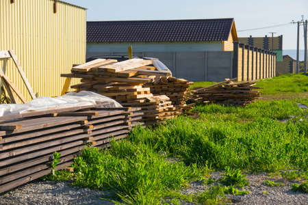 The wooden bars near the house constructionの写真素材