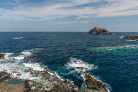 Surf at the rocky coastの写真素材